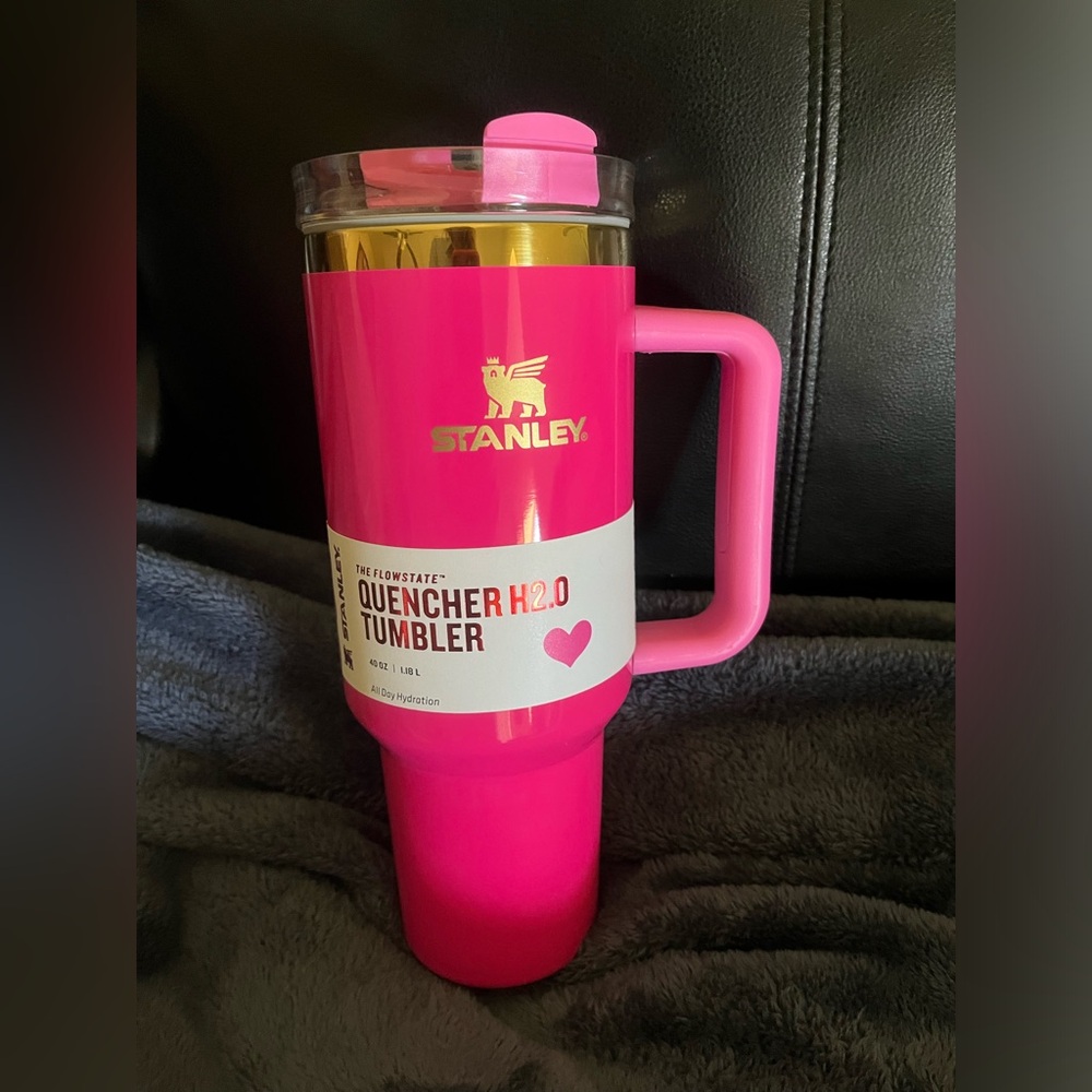 Very pretty Watermelon color smooth finish with a gold band new in box.